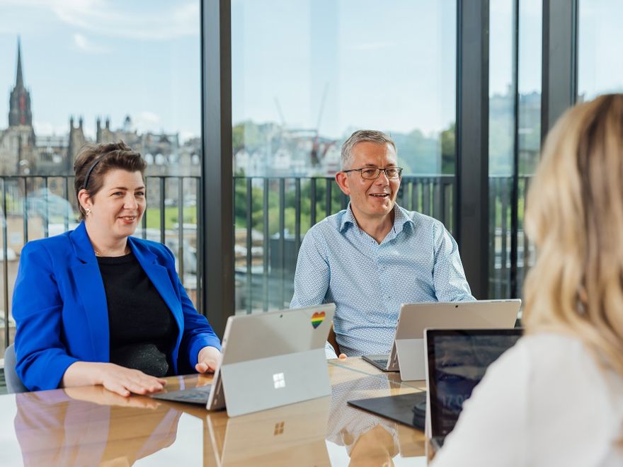 yuill and kyle employees having a meeting